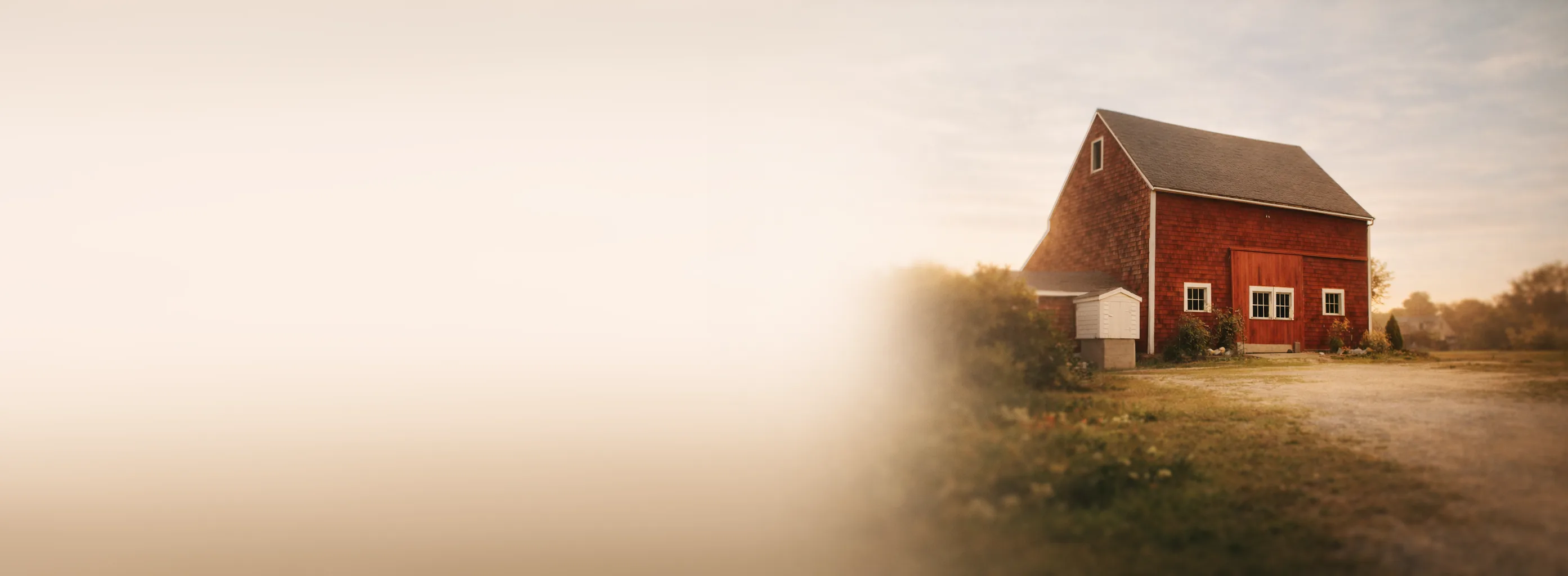 A red barn at sunrise — the barn that gave Red Barn Software its name